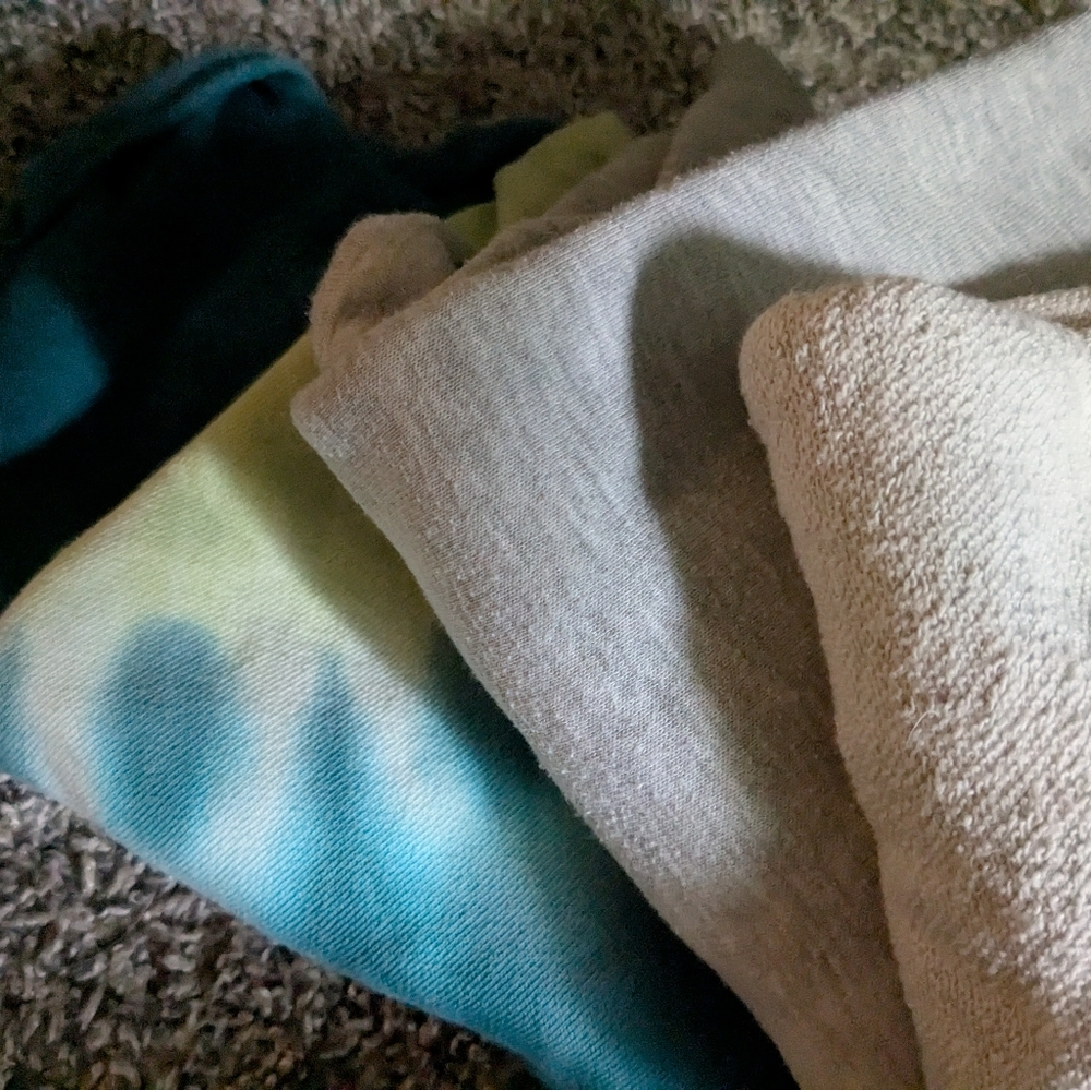 Colorful Tie-Dye and Gray Sweaters